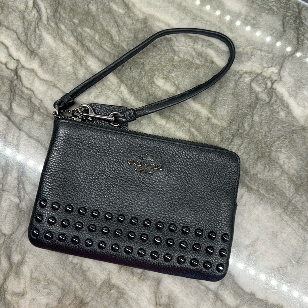 SOLD Coach studded wristlet. NEW